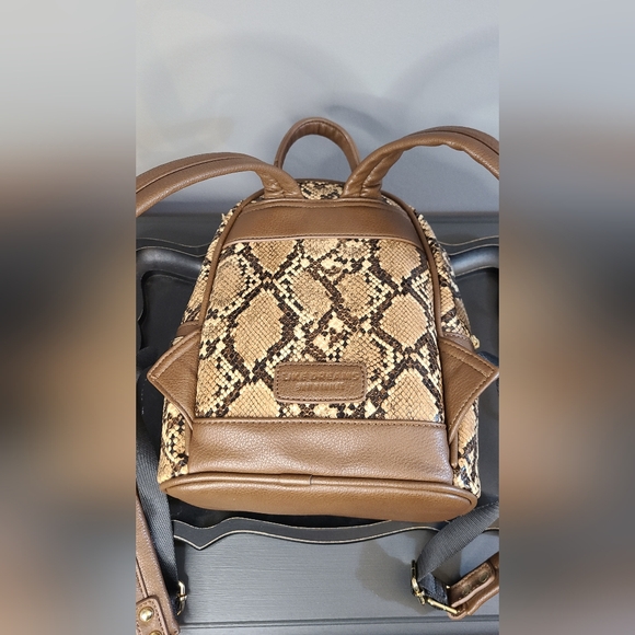 Like Dreams Faux brown snakeskin backpack. *missing fuzzy dangle in pictures - Picture 2 of 10